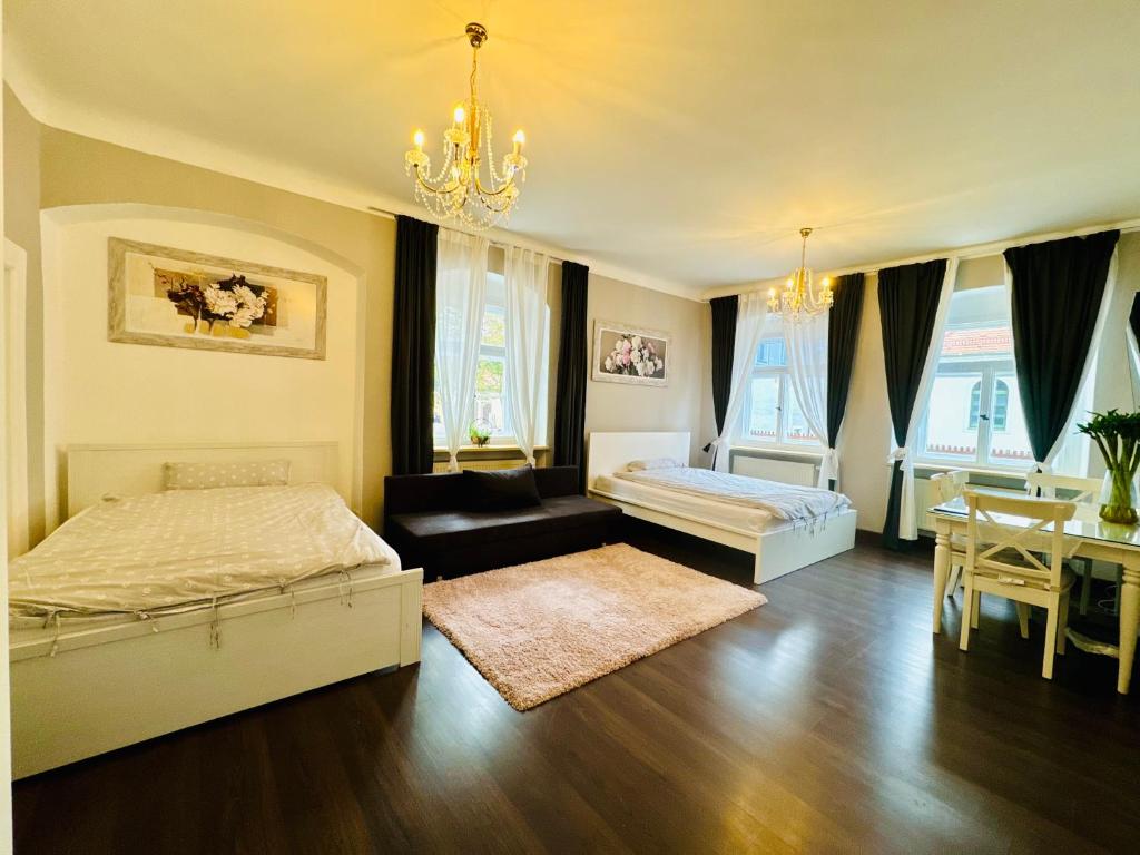 Postel nebo postele na pokoji v ubytování Apartments Oschatz