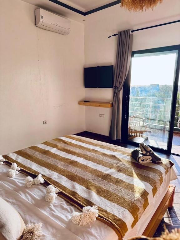 Postel nebo postele na pokoji v ubytování Villa azure