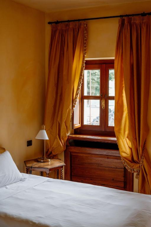Letto o letti in una camera di Hotel Casa Pavesi