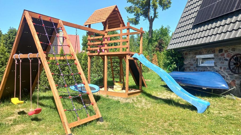 Herní místnost nebo prostor pro děti v ubytování Grygielówka nad jeziorem - sauna & jacuzzi