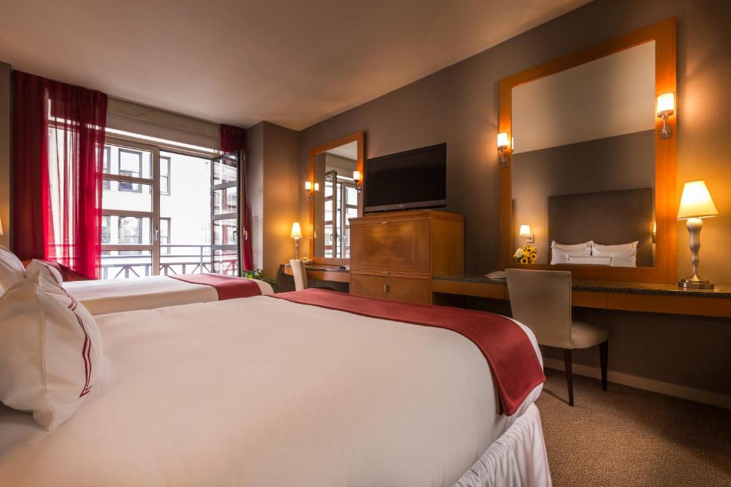 Postel nebo postele na pokoji v ubytování Hotel Giraffe by Library Hotel Collection