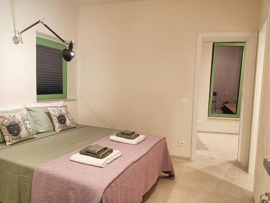 Postel nebo postele na pokoji v ubytování Acciana Rooms