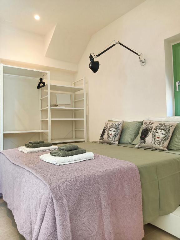 Postel nebo postele na pokoji v ubytování Acciana Rooms