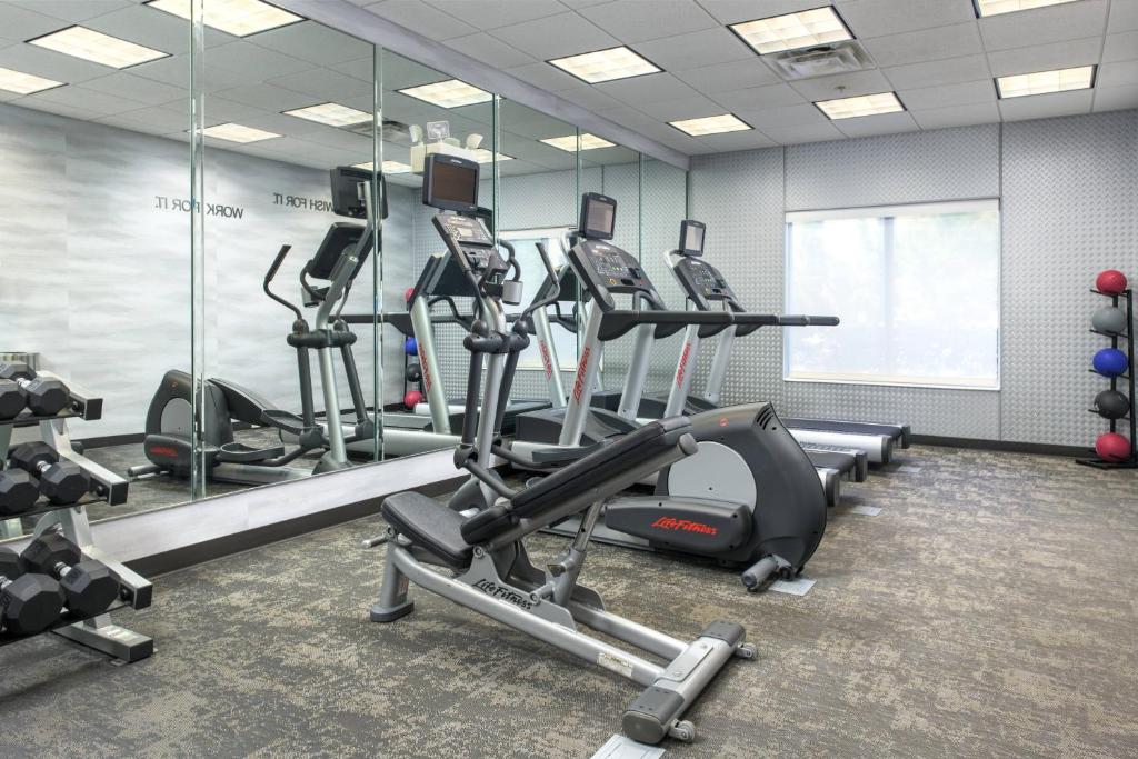 a gym with several treadmills and elliptical machines at Fairfield Inn & Suites Chattanooga I-24/Lookout Mountain in Chattanooga