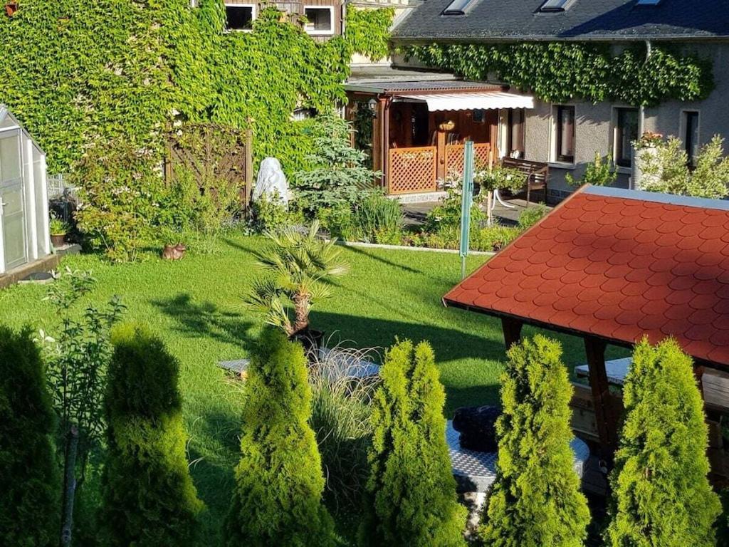 an aerial view of a garden with trees and a house at "Annelies" - barrier-free in Neufriedersdorf