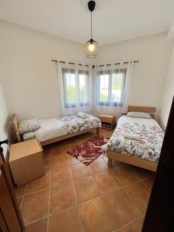 Postel nebo postele na pokoji v ubytování Appart magnifique Cabo Negro