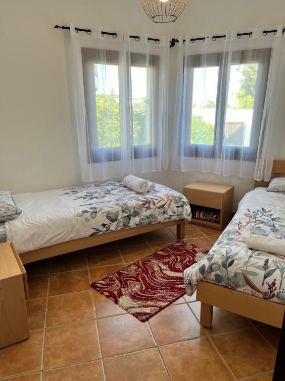 Postel nebo postele na pokoji v ubytování Appart magnifique Cabo Negro