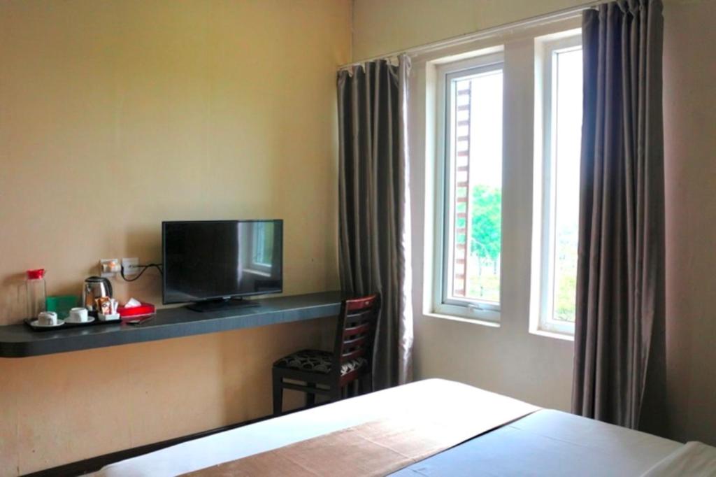 Postel nebo postele na pokoji v ubytování CREW EXPRESS Hotel
