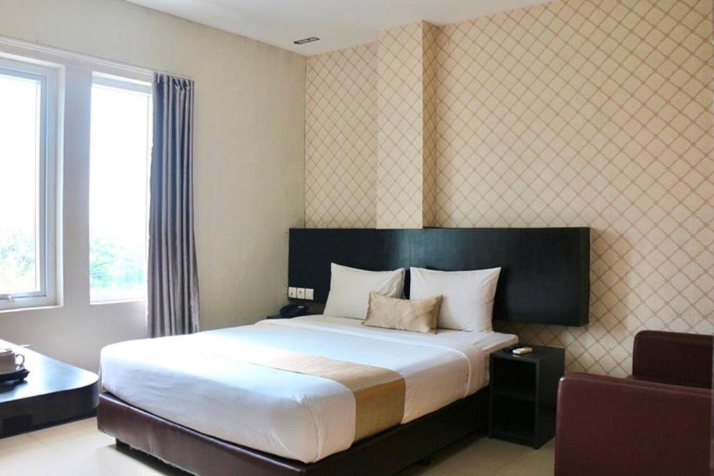 Postel nebo postele na pokoji v ubytování CREW EXPRESS Hotel