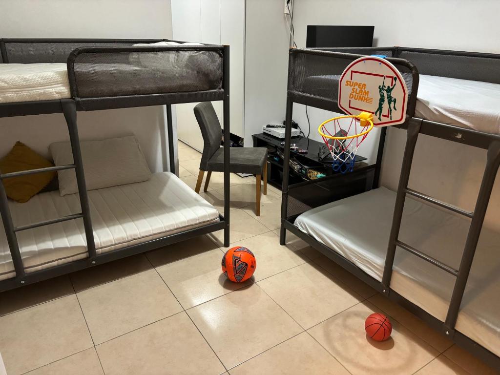 Postel nebo postele na pokoji v ubytování דירות בר אילן
