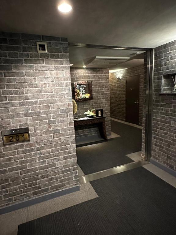 Kuchyň nebo kuchyňský kout v ubytování HOTEL Iz bayside 大人専用