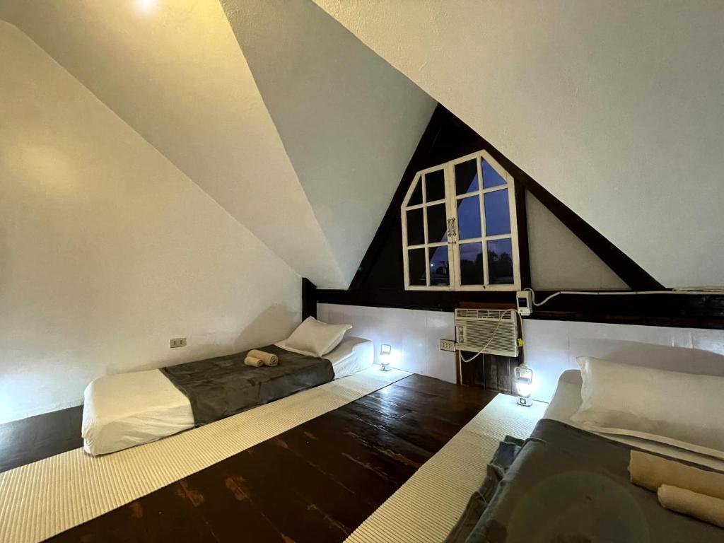 Postel nebo postele na pokoji v ubytování Trail Inn