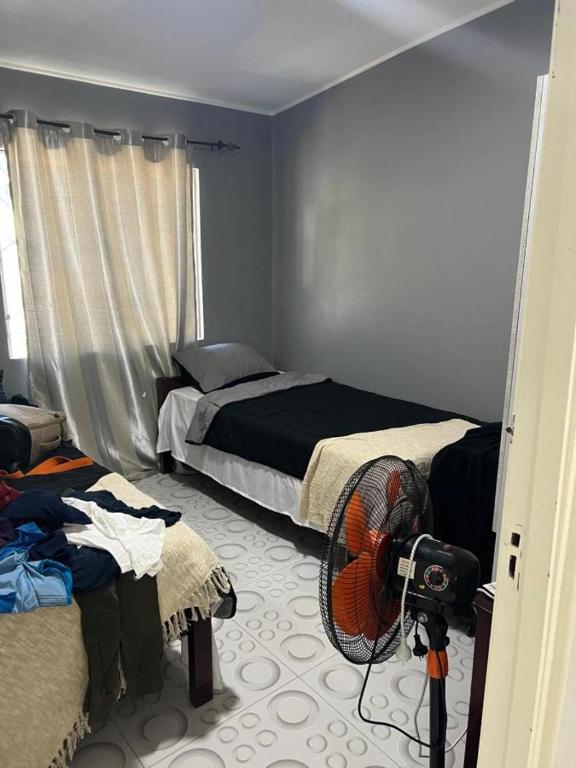 Postel nebo postele na pokoji v ubytování bula house fiji