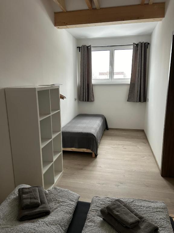 Postel nebo postele na pokoji v ubytování Horský dům Vojta