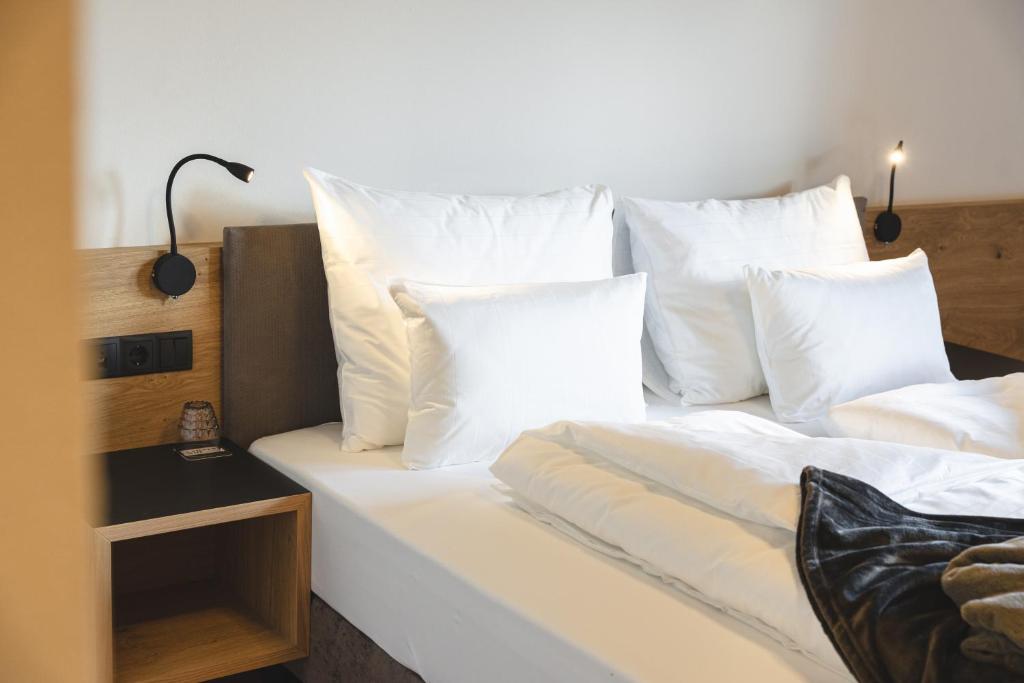 Postel nebo postele na pokoji v ubytování Hotel Lahnerhof