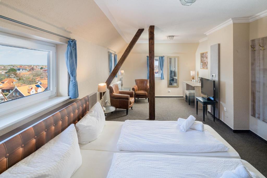 Postel nebo postele na pokoji v ubytování Inselhotel Langeoog