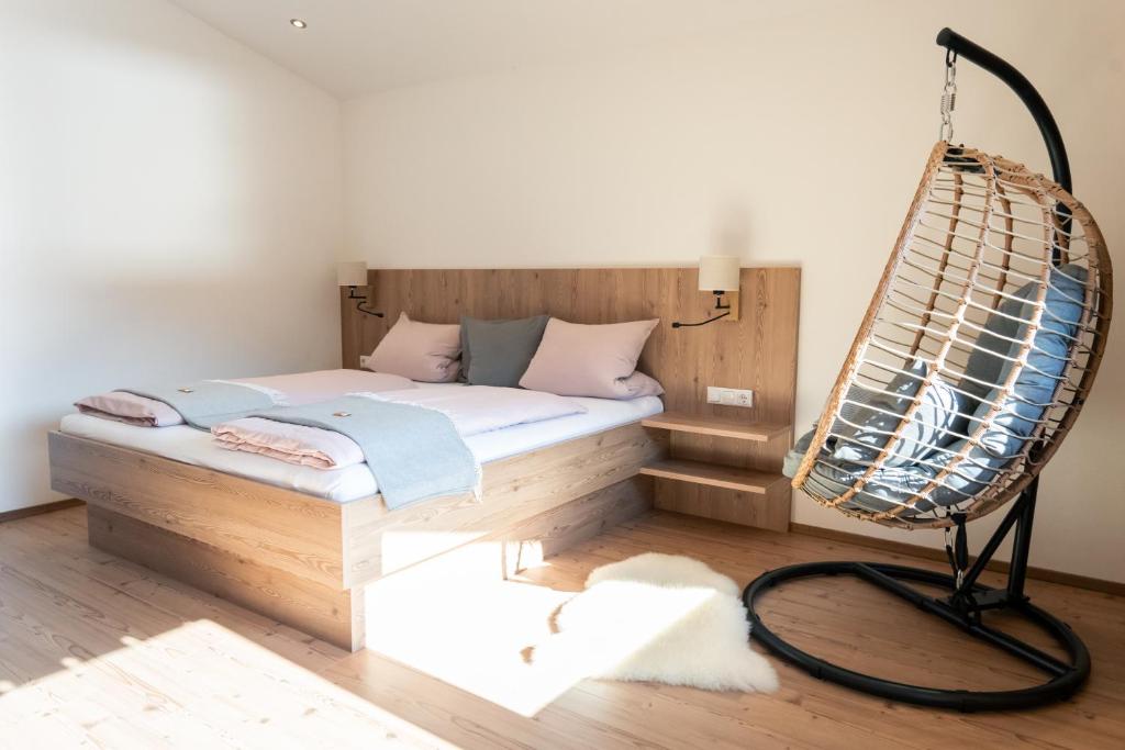 Rúm í herbergi á Nagelehof Apartment Bendelstein