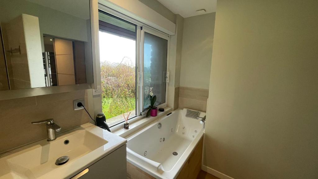 Koupelna v ubytování Chambre d hôtes le 23
