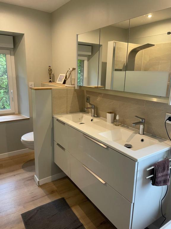 Koupelna v ubytování Chambre d hôtes le 23