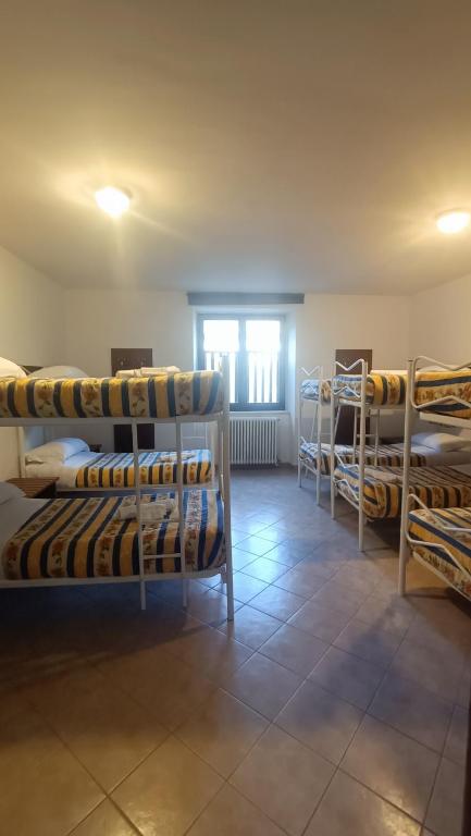 Postel nebo postele na pokoji v ubytování Hotel Altevie