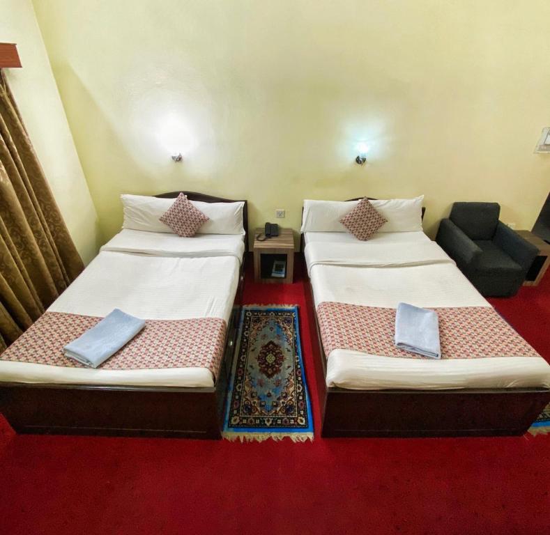 Postel nebo postele na pokoji v ubytování Hotel Blue Magnet