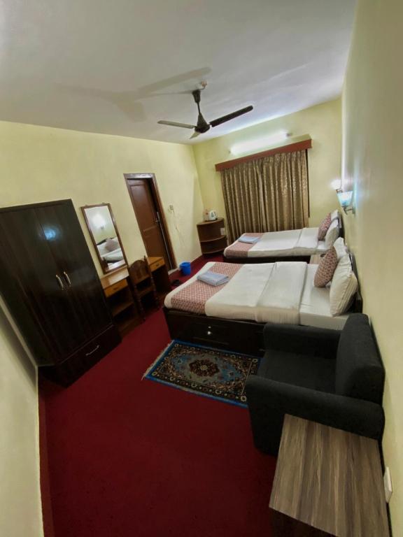 Postel nebo postele na pokoji v ubytování Hotel Blue Magnet
