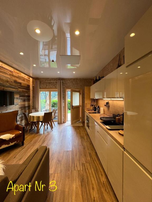 Kuchyň nebo kuchyňský kout v ubytování Alpenburg Bergparadies Apartments