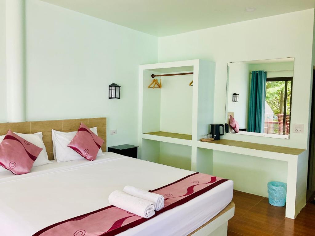 Postel nebo postele na pokoji v ubytování Ocean View Resort
