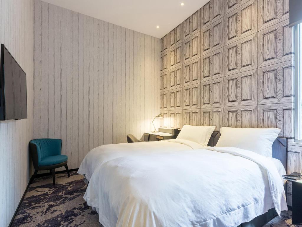 Katil atau katil-katil dalam bilik di Tango Inn Taipei Jihe