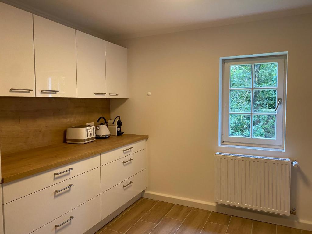 Kuchyň nebo kuchyňský kout v ubytování Haus Kessenich