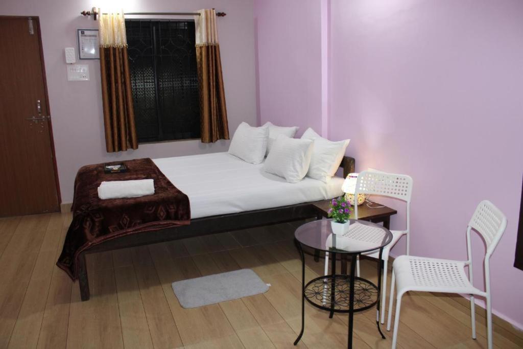 Postel nebo postele na pokoji v ubytování GuruVilla by TriSam Villa