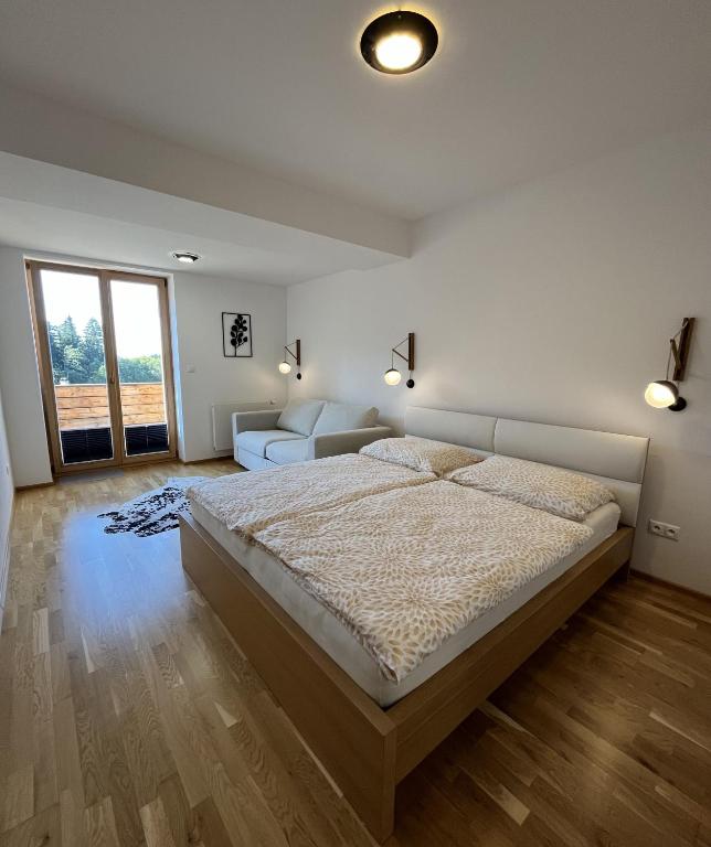 Postel nebo postele na pokoji v ubytování Slunečný apartmán