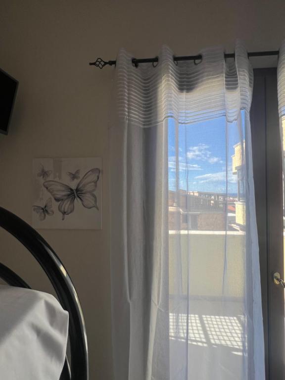 Postel nebo postele na pokoji v ubytování Incanto B&B