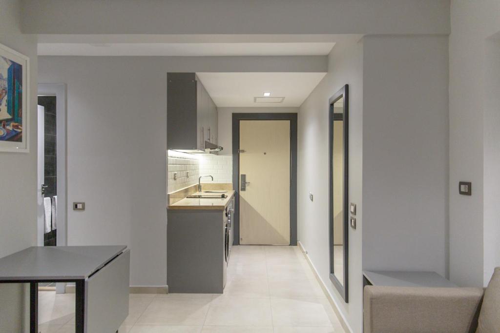 Kuchyň nebo kuchyňský kout v ubytování Rhactus House San Stefano