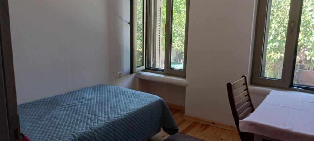Postel nebo postele na pokoji v ubytování Vagia's Home