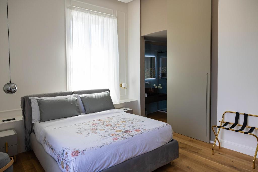 Postel nebo postele na pokoji v ubytování Bed and Breakfast SirenaResina