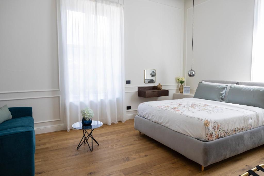 Postel nebo postele na pokoji v ubytování Bed and Breakfast SirenaResina