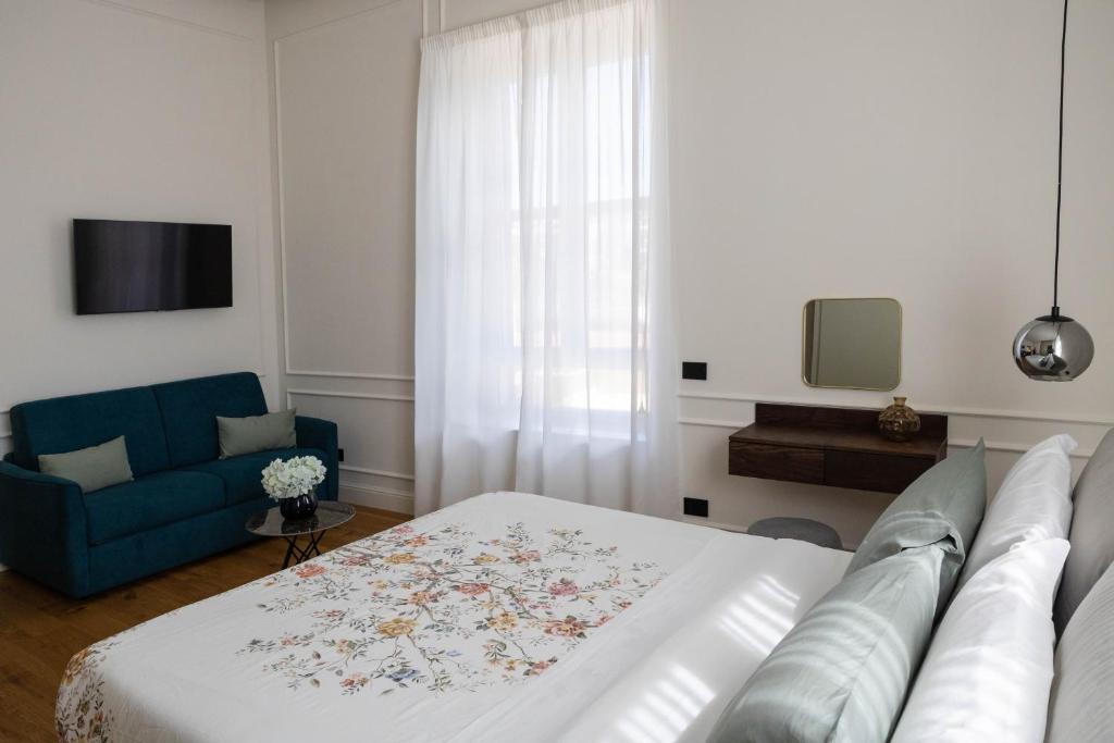 Postel nebo postele na pokoji v ubytování Bed and Breakfast SirenaResina