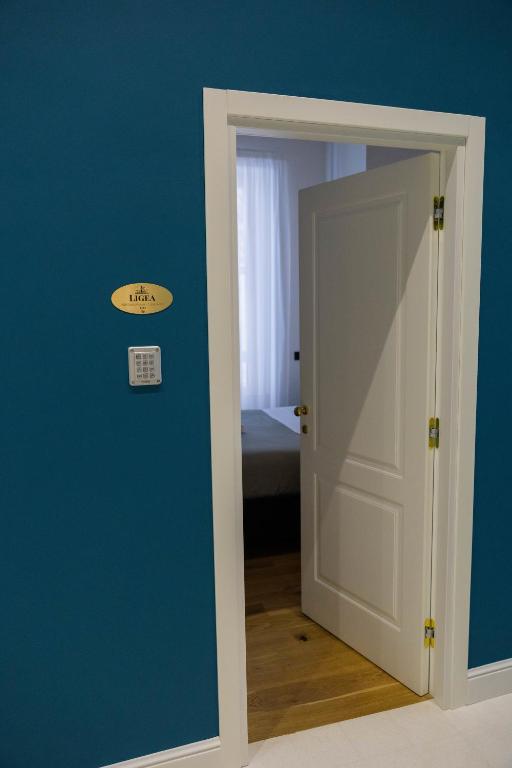 Postel nebo postele na pokoji v ubytování Bed and Breakfast SirenaResina