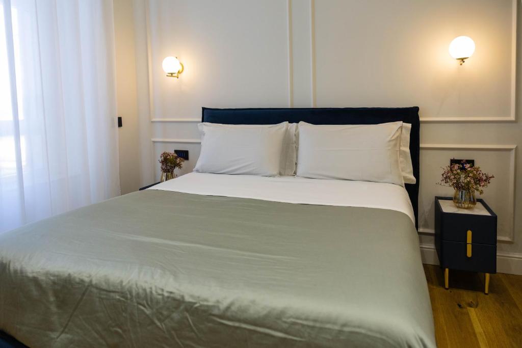 Postel nebo postele na pokoji v ubytování Bed and Breakfast SirenaResina