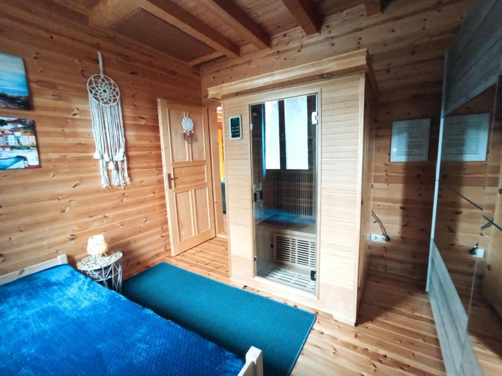 Postel nebo postele na pokoji v ubytování Moon Wood