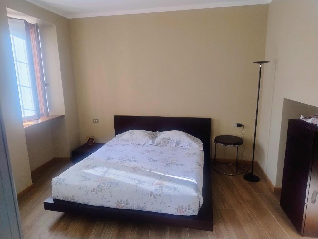 Postel nebo postele na pokoji v ubytování Casa Acquerello