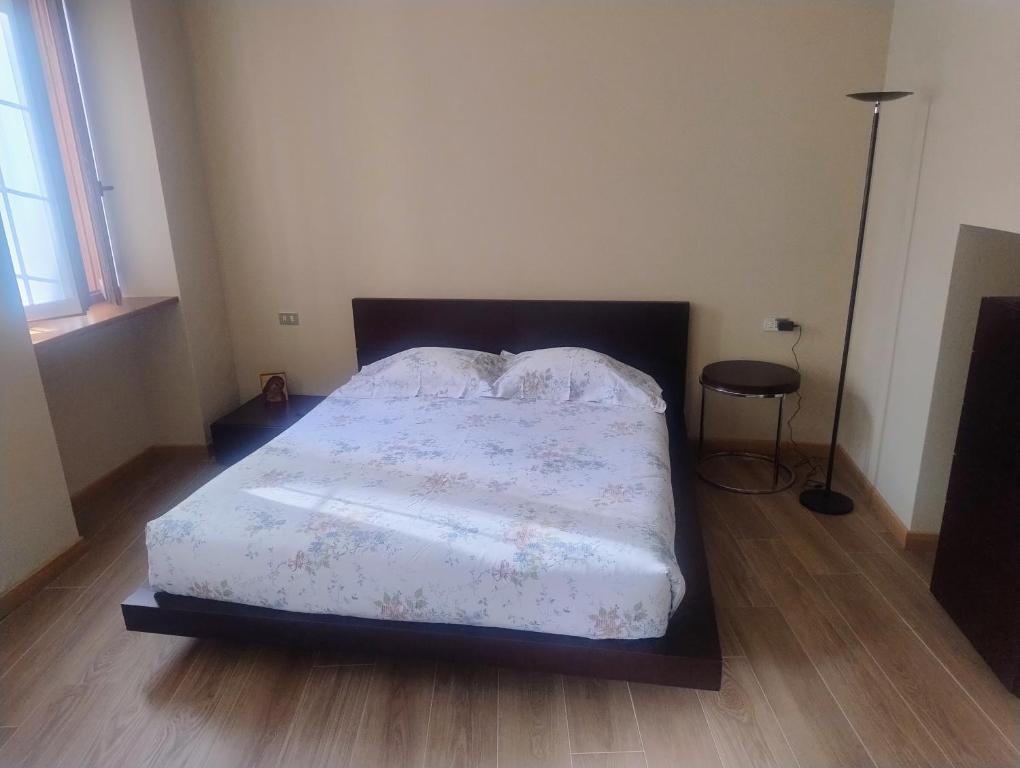 Postel nebo postele na pokoji v ubytování Casa Acquerello