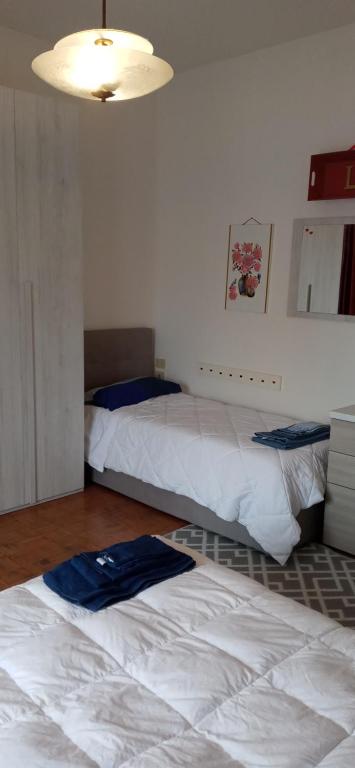 A bed or beds in a room at Sara