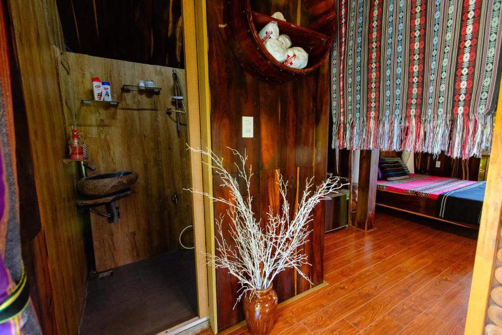 Postel nebo postele na pokoji v ubytování Homestay Ako Ea