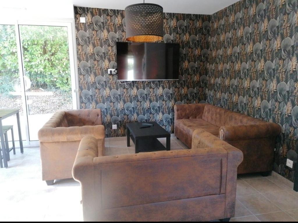Posezení v ubytování La villa de Sofie