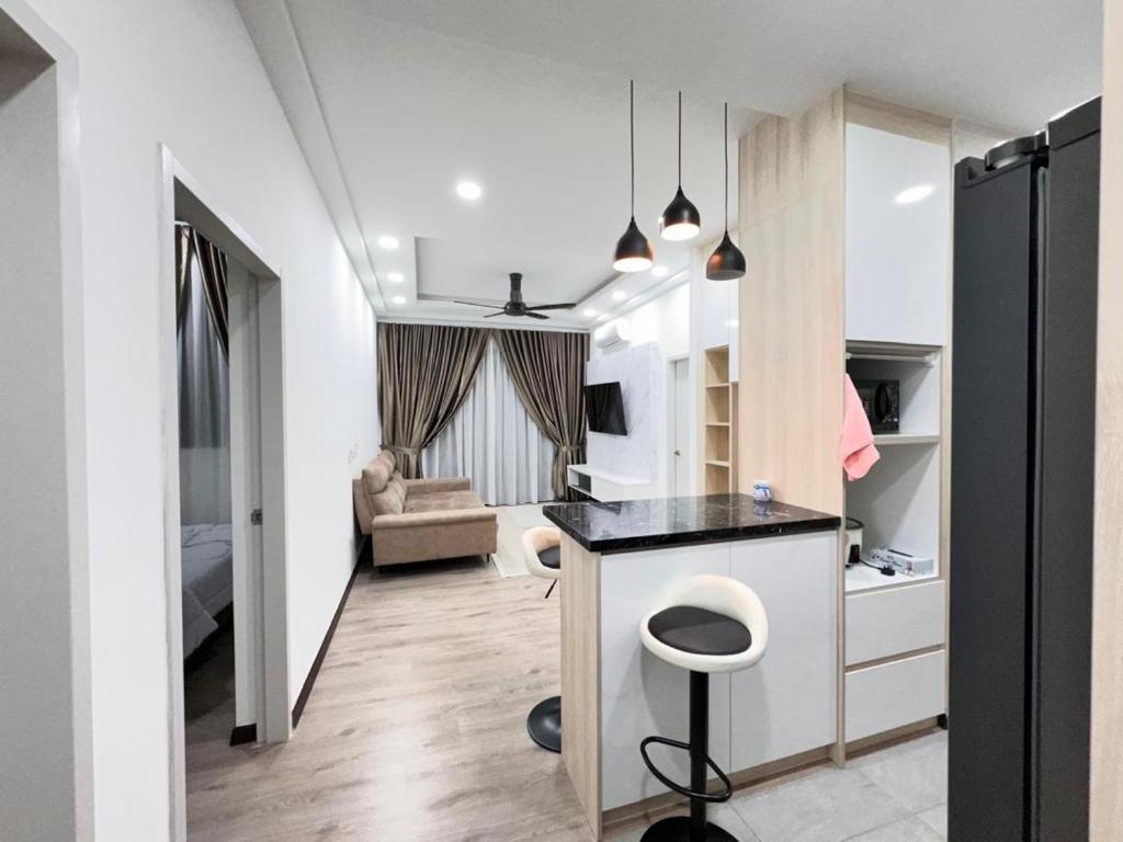 TV a/nebo společenská místnost v ubytování Homestay Abg Ipar