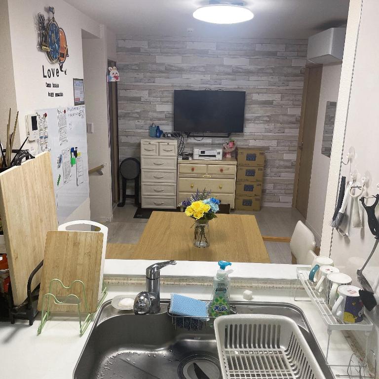 Kuchyň nebo kuchyňský kout v ubytování 東京小岩与房东同住mishe