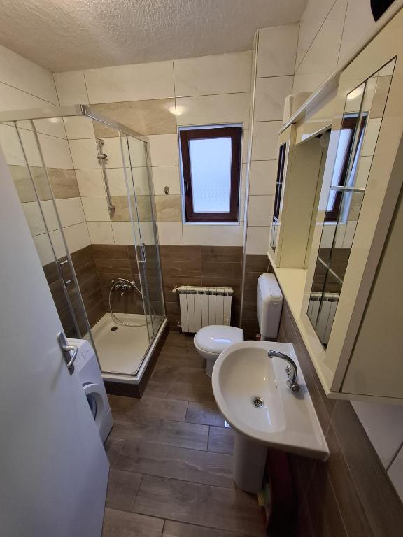 Kúpeľňa v ubytovaní Apartments Maximir
