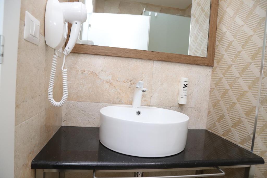 Koupelna v ubytování Sky Hotel